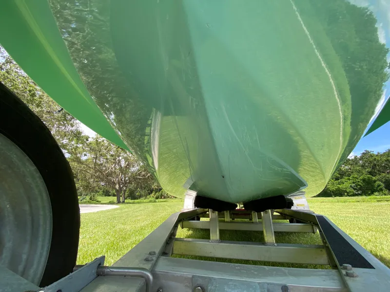 Slide: The Image of Underneath view of a 2020 East Cape 18 EVO boat on a trailer. - 9