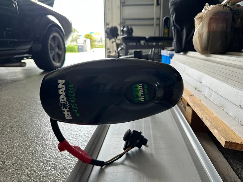 Slide: The Image of Rhodan GPS Anchor on Yellowfin 24 Bay CE, 2019 model, in a garage setting. - 37