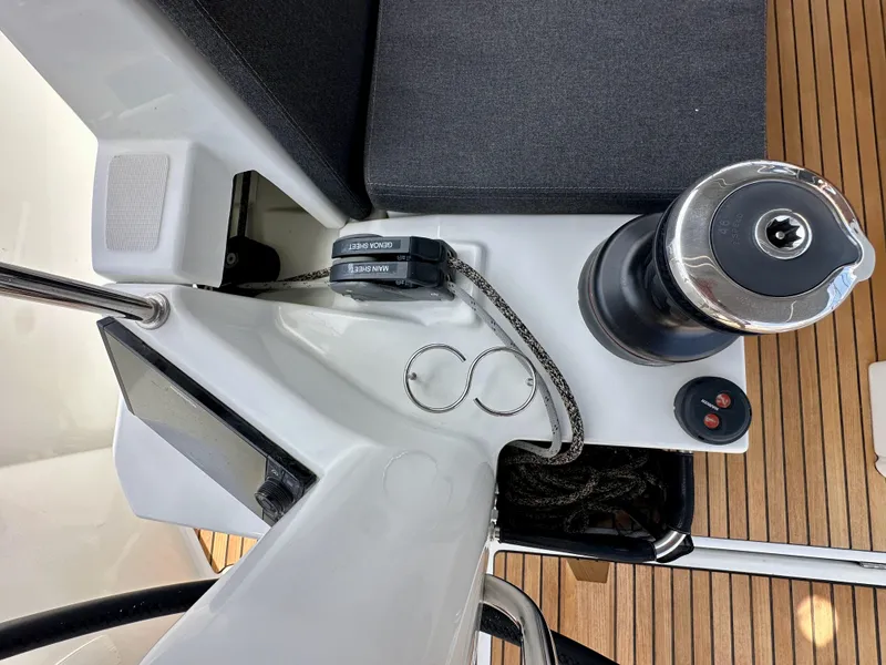 Slide: The Image of Cockpit controls of 2021 Jeanneau Sun Odyssey 440 sailboat with winch and rope management. - 21