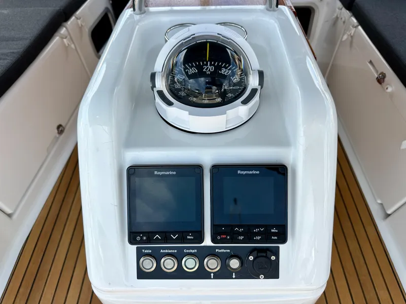 Slide: The Image of Jeanneau Sun Odyssey 440 cockpit with compass and Raymarine displays, 2021 model. - 23