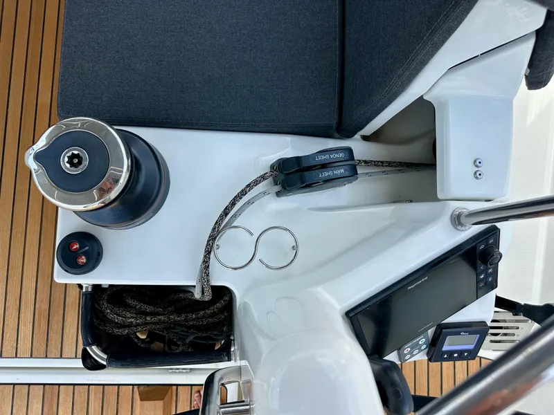 Slide: The Image of Cockpit view of 2021 Jeanneau Sun Odyssey 440 sailboat with winch and control panel. - 27
