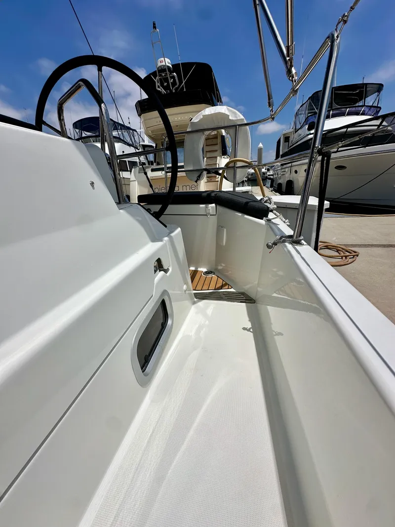 Slide: The Image of 2021 Jeanneau Sun Odyssey 440 yacht deck, featuring sleek design and modern amenities. - 43
