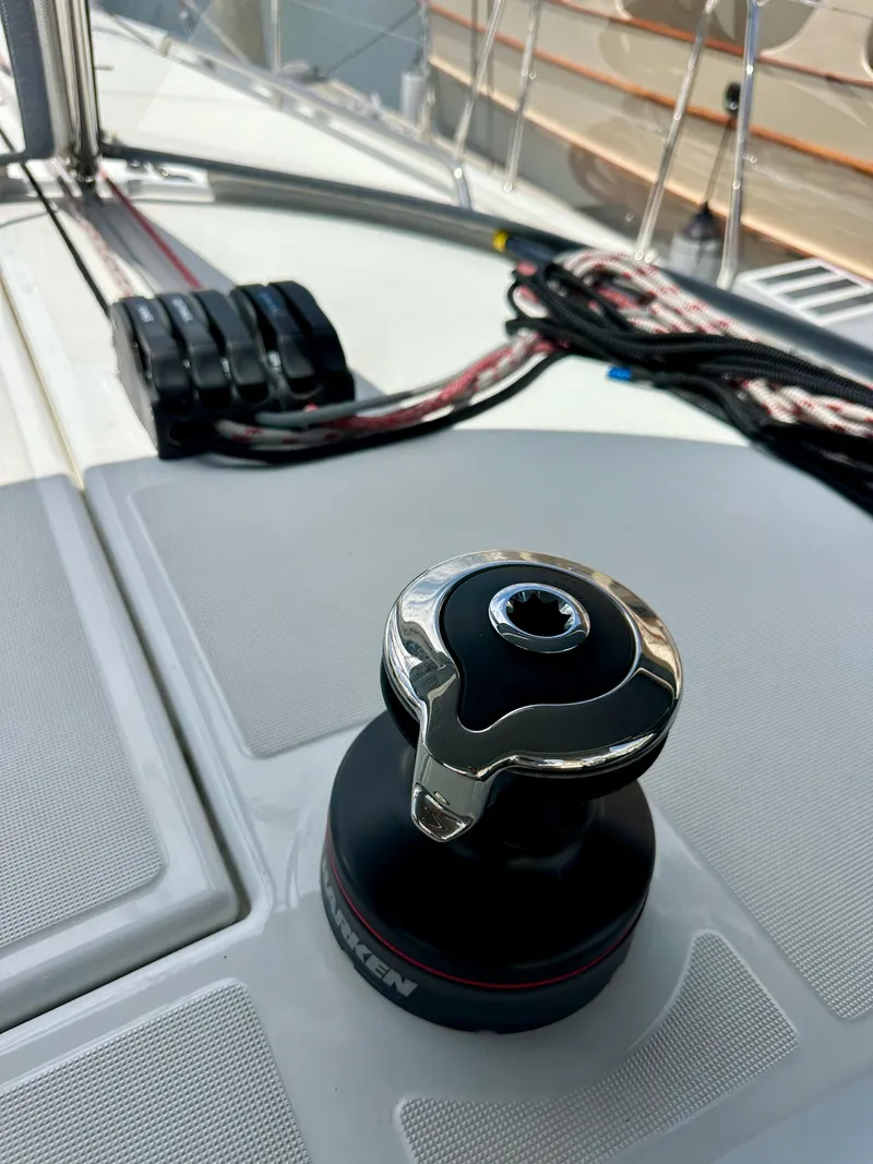 Slide: The Image of Winch and ropes on Jeanneau Sun Odyssey 440 sailboat deck, 2021 model. - 49