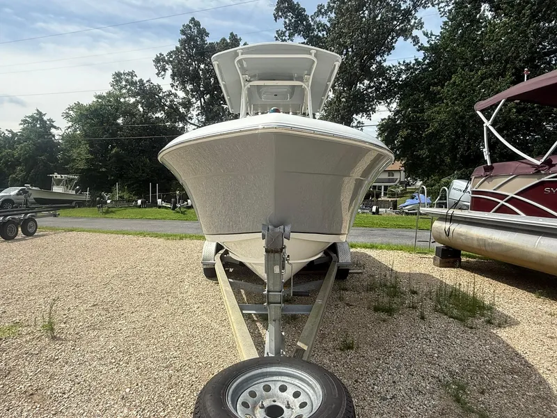 Slide: The Image of 2018 Clearwater 2200CC boat on trailer, parked outdoors on gravel. - 4