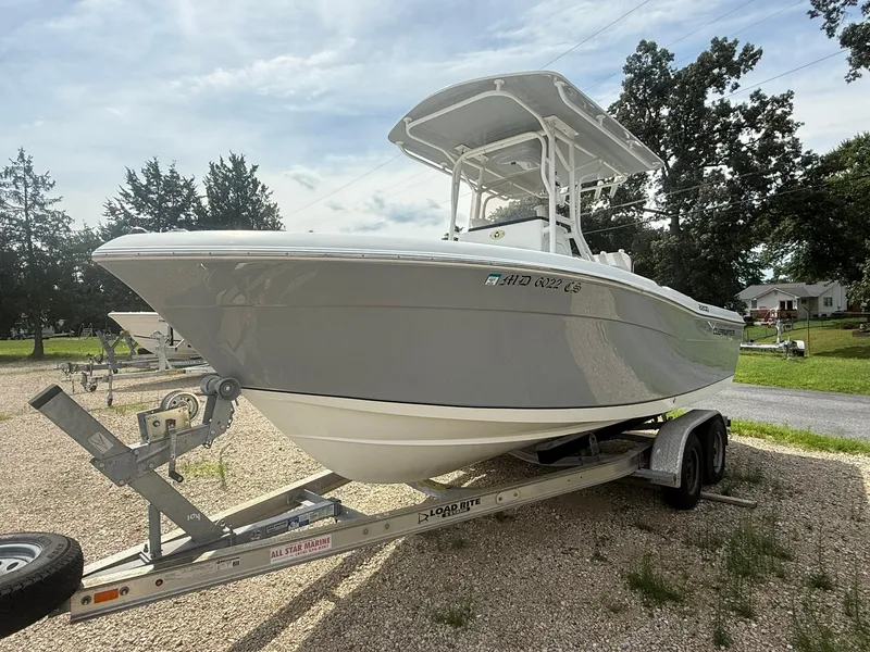 Slide: The Image of 2018 Clearwater 2200CC boat on trailer, parked outdoors on gravel. - 5