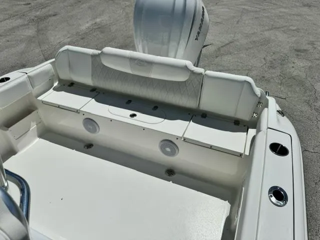 Slide: The Image of 2026 Key West 239 FS boat interior with seating and Yamaha engine. - 9