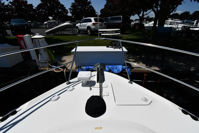 Slide: The Image of Bow view of 1997 Sea Ray 400 Sundancer docked at marina. - 3
