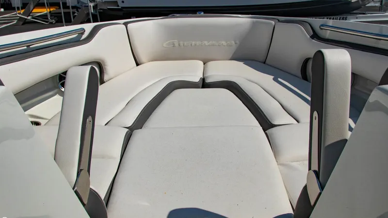 Slide: The Image of 2023 Crownline 290 XSS boat interior with plush seating and modern design. - 7