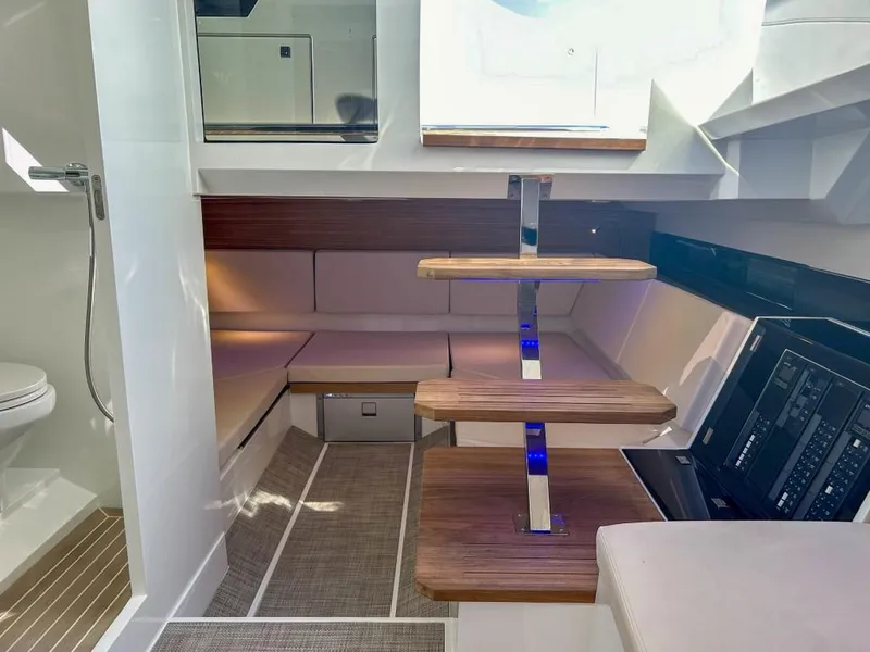 Slide: The Image of Interior of 2024 De Antonio Yachts D36 OPEN, featuring modern design and wooden accents. - 12