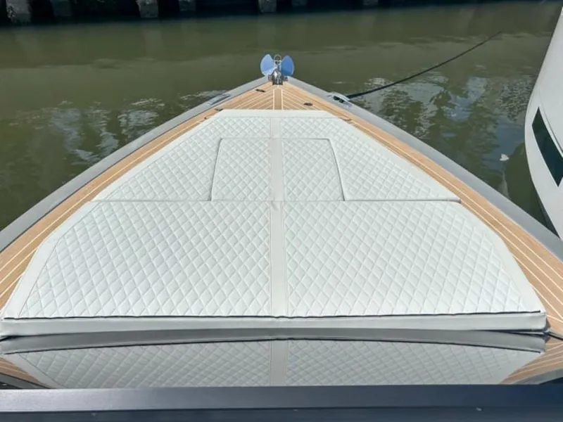 Slide: The Image of 2024 De Antonio Yachts D28 Cruiser bow with quilted sunbed and teak decking. - 16