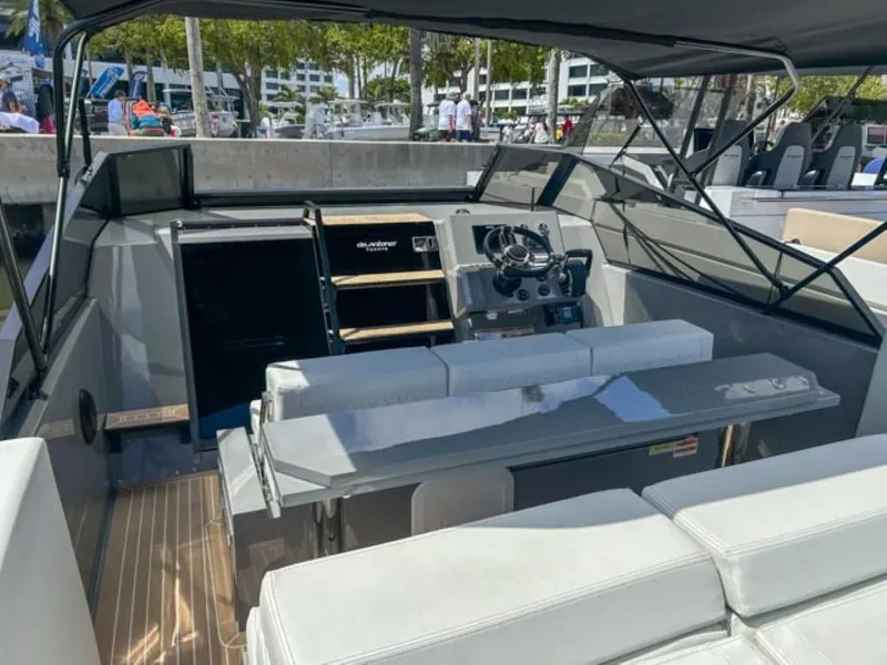 Slide: The Image of 2024 De Antonio Yachts D28 Cruiser interior with modern helm and seating. - 6