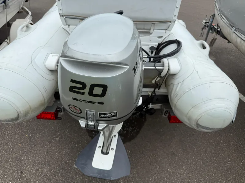 Slide: The Image of 2011 Walker Bay Genesis 310FTD with Honda 20HP outboard motor, rear view. - 7