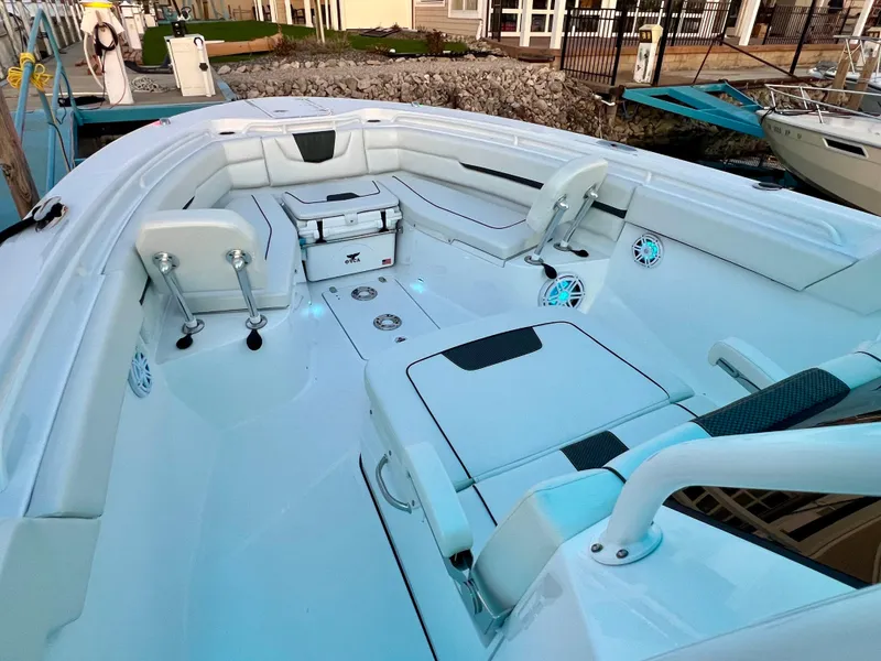 Slide: The Image of 2026 Wellcraft 352 Fisherman boat interior with seating and storage compartments. - 16