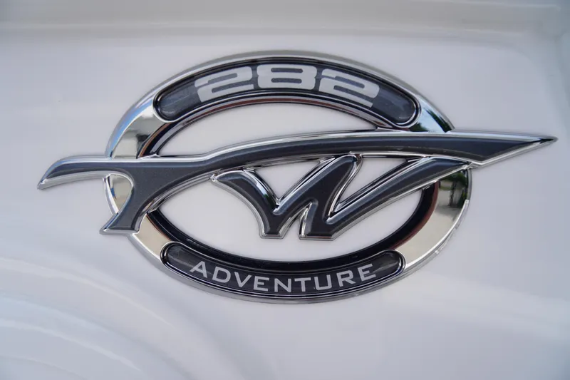 Slide: The Image of 2026 Tidewater 282 CC Adventure logo on boat exterior. - 1