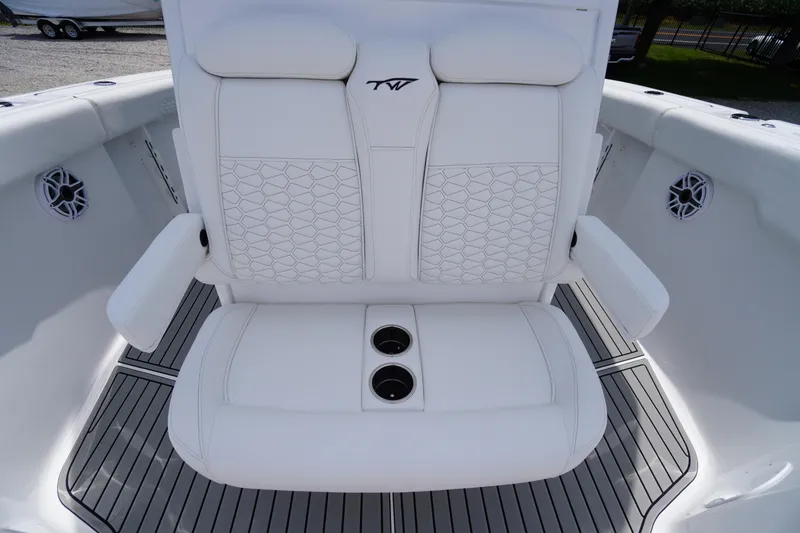 Slide: The Image of Luxurious seating on 2026 Tidewater 282 CC Adventure boat with cup holders and armrests. - 20