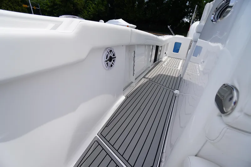 Slide: The Image of 2026 Tidewater 282 CC Adventure boat deck with sleek design and modern features. - 22
