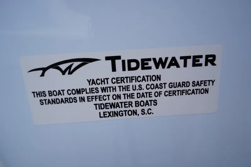 Slide: The Image of Sticker on Tidewater 282 CC Adventure 2026, certifying U.S. Coast Guard safety compliance. - 36