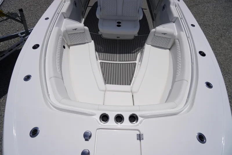Slide: The Image of 2026 Tidewater 282 CC Adventure boat with spacious white seating and sleek design. - 8