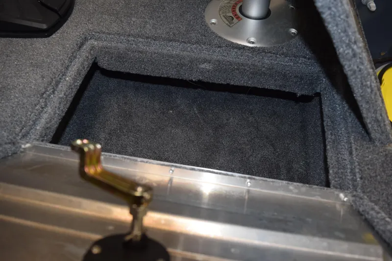 Slide: The Image of 2025 Tracker Super Guide V16 T boat interior storage compartment. - 9