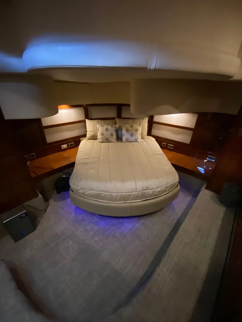 Slide: The Image of Luxurious bedroom interior of 2008 Sea Ray 47DB yacht with ambient lighting. - 21