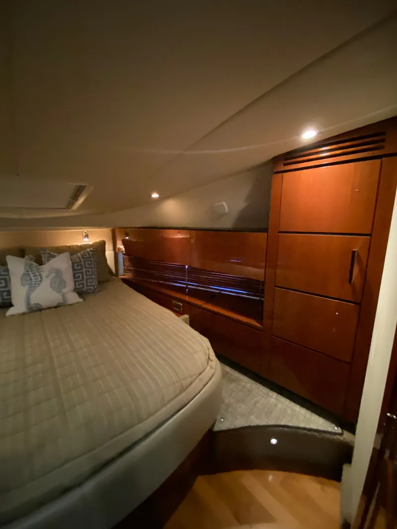 Slide: The Image of Luxurious cabin interior of 2008 Sea Ray 47DB yacht with elegant wood finish. - 24