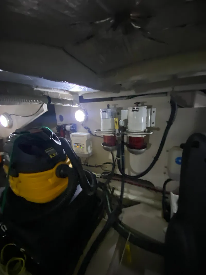 Slide: The Image of Engine room of 2008 Sea Ray 47DB yacht with equipment and lighting. - 46