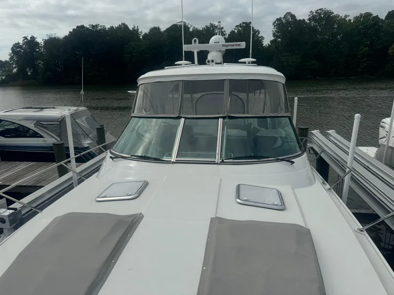 Slide: The Image of 2023 Formula 40 PC yacht cockpit with modern controls and plush seating. - 10