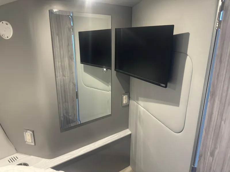 Slide: The Image of Interior of 2023 Formula 40 PC with wall-mounted TV and mirror. - 19
