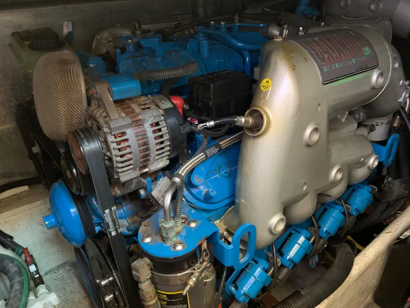 Slide: The Image of Engine of a 2012 Silverton 33 Sport Coupe, showcasing detailed mechanical components. - 46