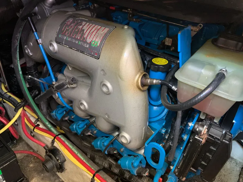 Slide: The Image of Engine compartment of a 2012 Silverton 33 Sport Coupe with clean emission system. - 47