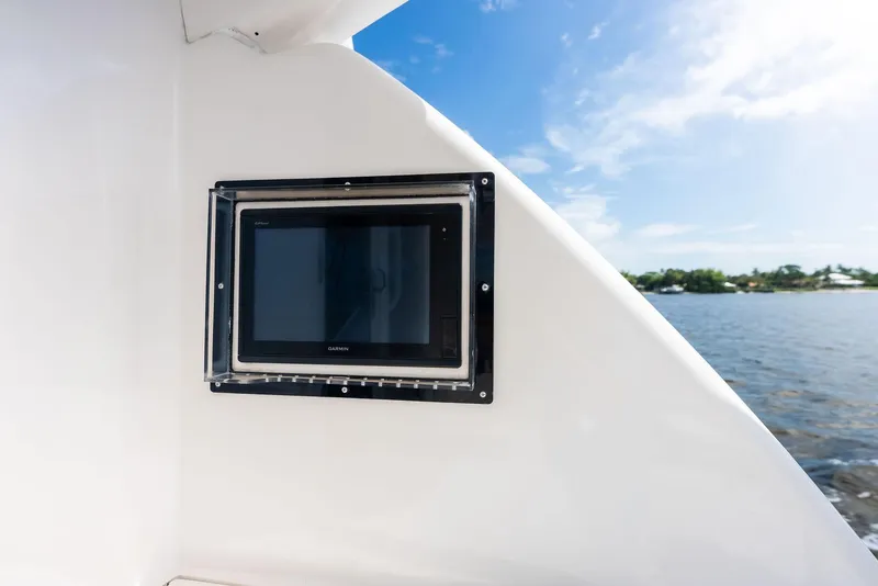 Slide: The Image of Garmin display on 2004 Bertram 570 yacht, with scenic water view. - 19