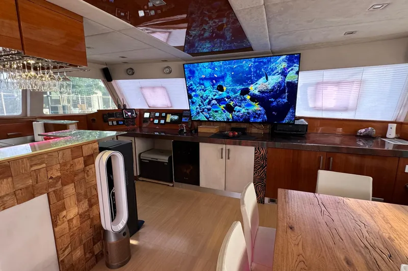 Slide: The Image of Luxurious interior of 2011 Sunreef 62 yacht with modern decor and large TV display. - 20
