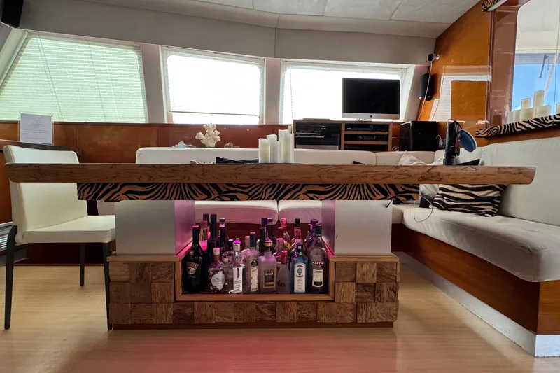 Slide: The Image of Luxurious Sunreef 62 yacht interior with stylish bar and zebra-patterned decor, 2011 model. - 22