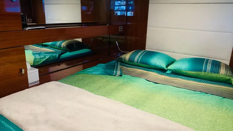 Slide: The Image of Luxurious bedroom interior on a 2011 Sunreef 62 yacht with elegant bedding. - 32