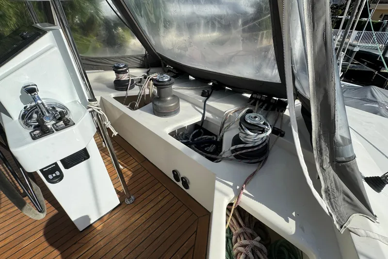 Slide: The Image of Cockpit of 2011 Sunreef 62 yacht with winches and steering wheel. - 37