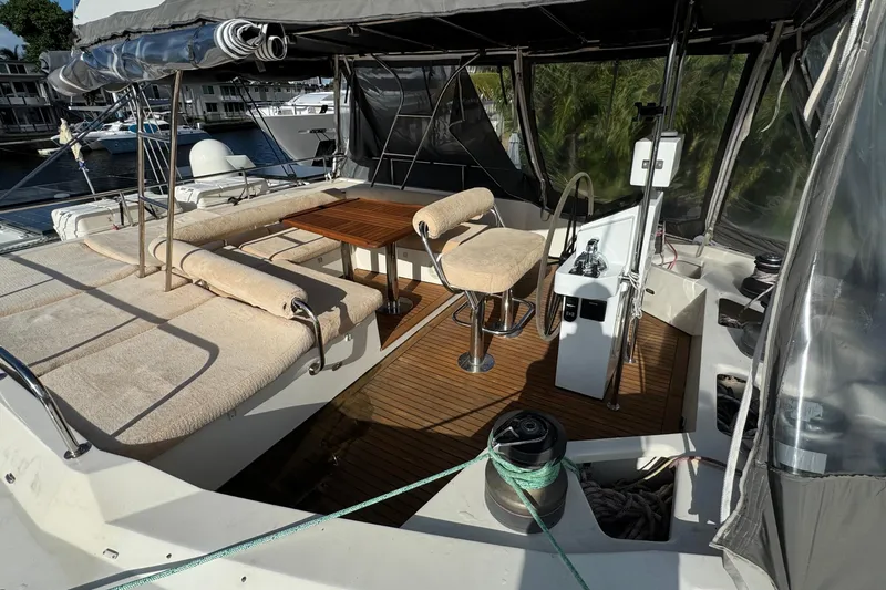 Slide: The Image of Luxurious 2011 Sunreef 62 yacht cockpit with seating, table, and helm station. - 42