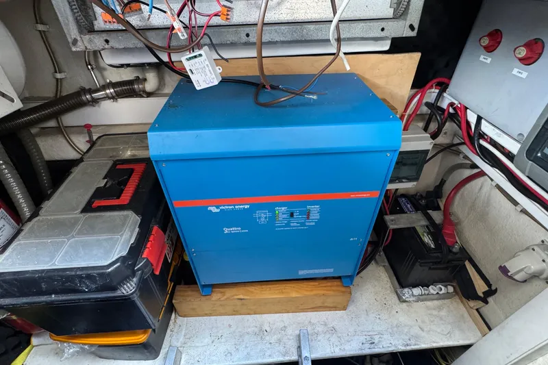 Slide: The Image of Electrical system setup in a 2011 Sunreef 62 yacht, featuring Victron Energy equipment. - 49