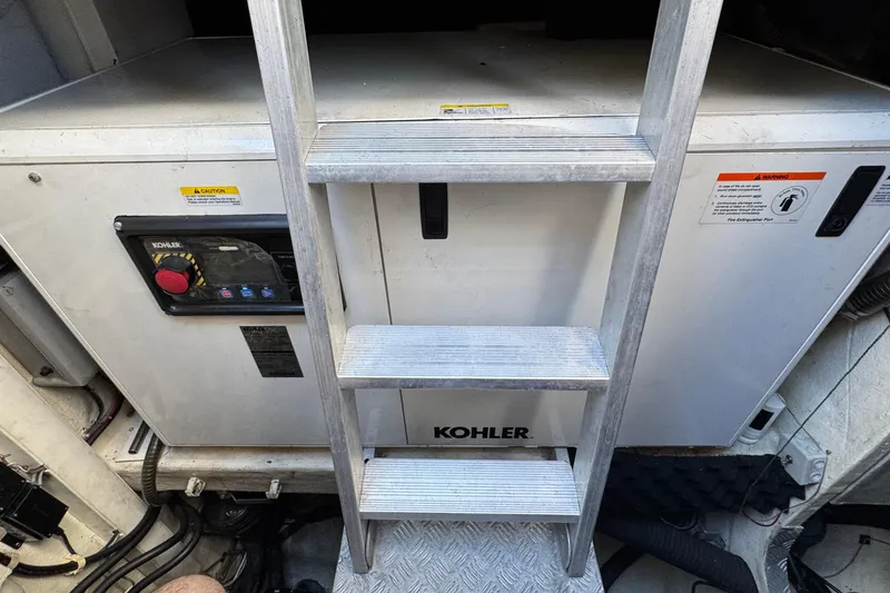 Slide: The Image of Engine room of 2011 Sunreef 62 yacht with Kohler generator and ladder. - 50