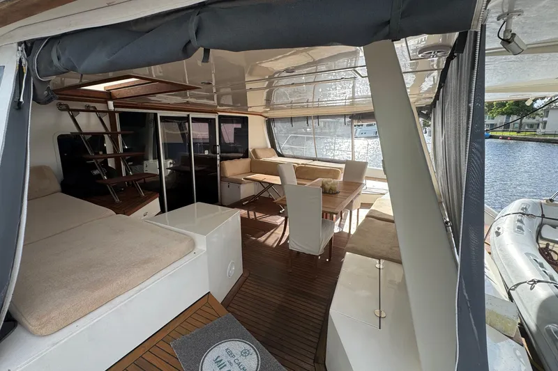 Slide: The Image of Luxurious interior of 2011 Sunreef 62 yacht with elegant seating and dining area. - 7