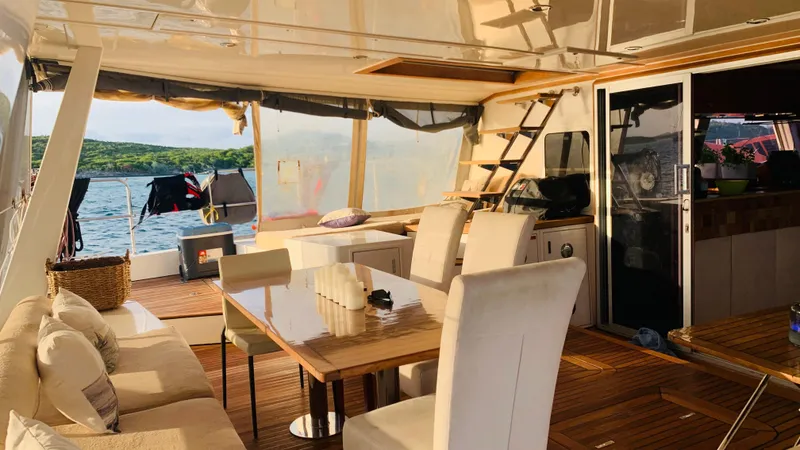 Slide: The Image of Luxurious Sunreef 62 yacht interior with elegant dining area, 2011 model. - 9