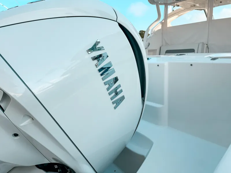 Slide: The Image of 2022 Pursuit DC 365 Dual Console with Yamaha engine, showcasing sleek design and modern features. - 7