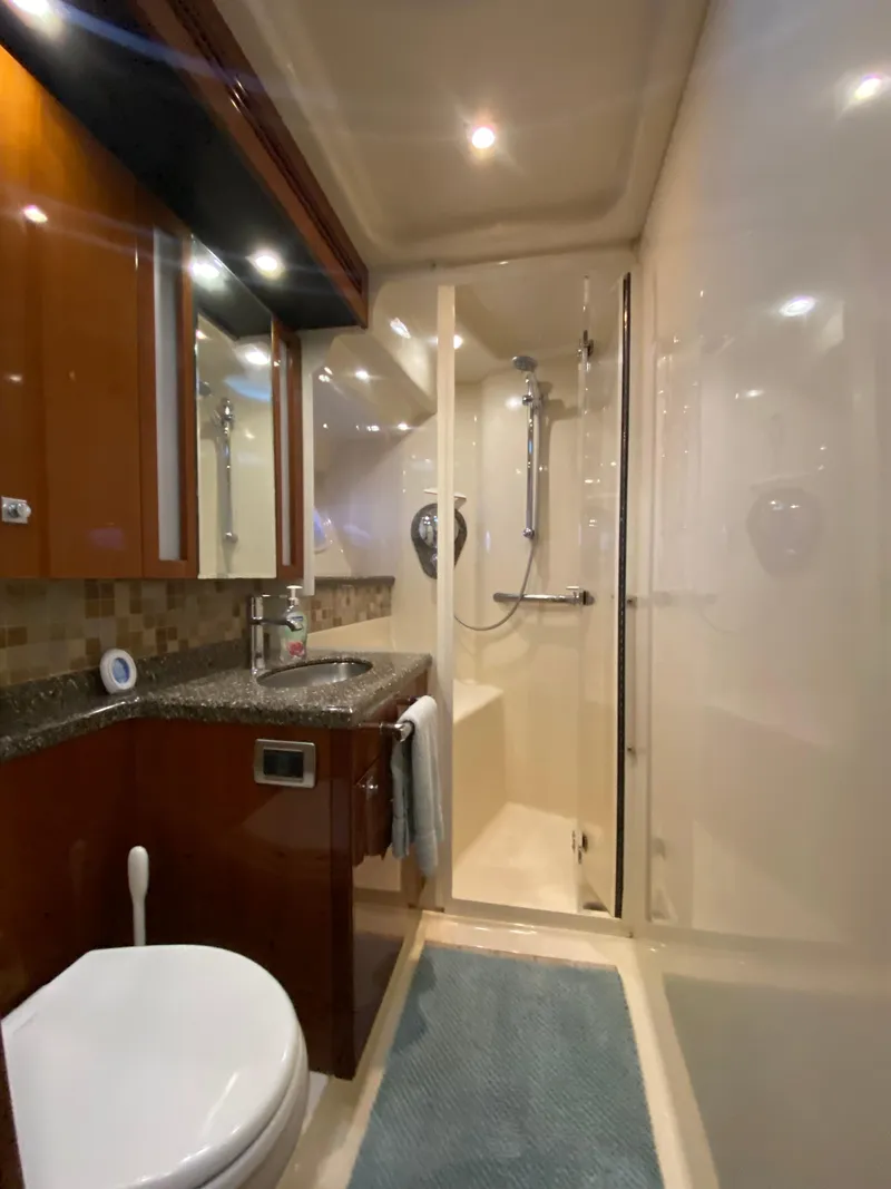 Slide: The Image of Luxurious bathroom in 2008 Sea Ray 47 Sedan Bridge yacht with shower and modern fixtures. - 21