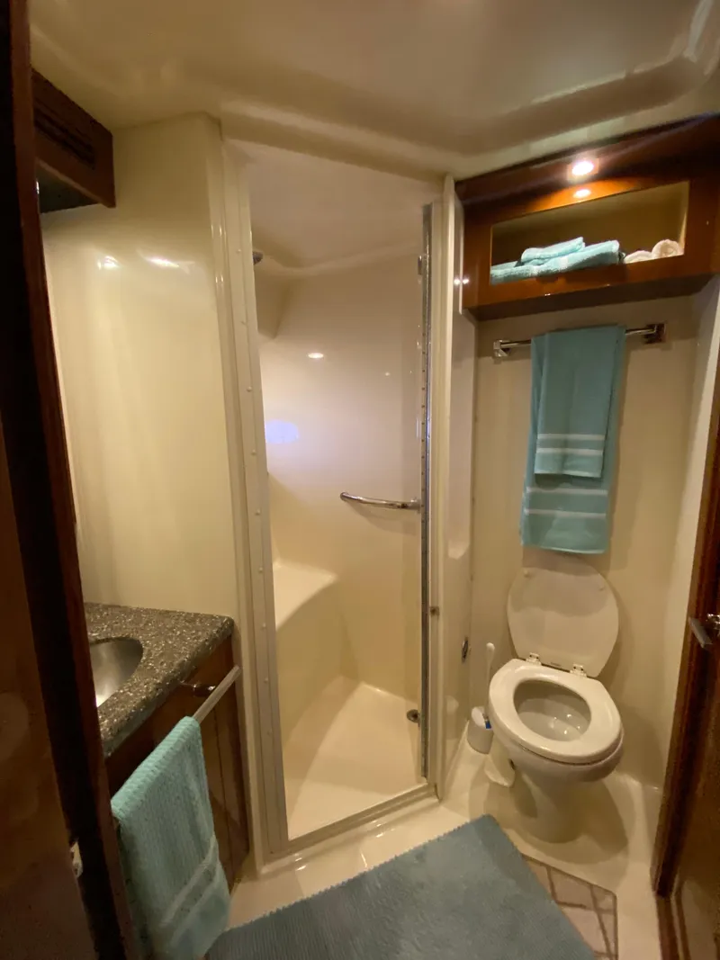 Slide: The Image of Bathroom interior of 2008 Sea Ray 47 Sedan Bridge yacht with shower and toilet. - 25