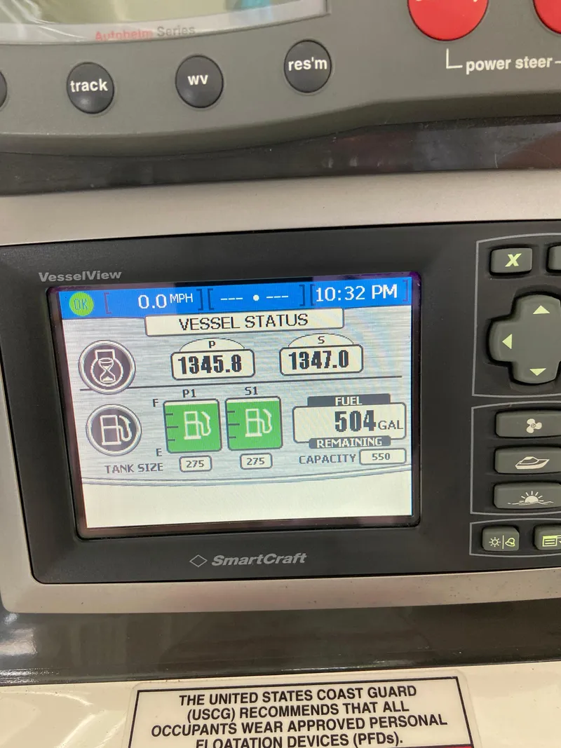 Slide: The Image of VesselView display on 2008 Sea Ray 47 Sedan Bridge showing fuel status and engine hours. - 32