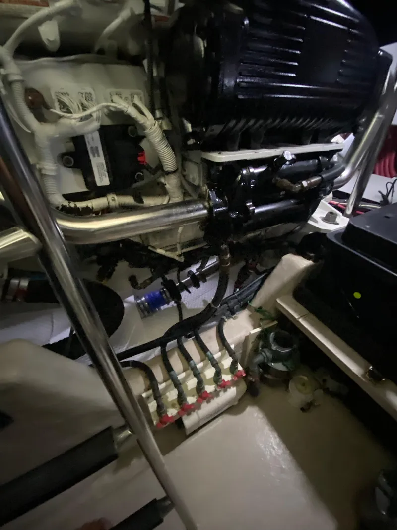 Slide: The Image of Engine room of a 2008 Sea Ray 47 Sedan Bridge yacht, showcasing mechanical components. - 46