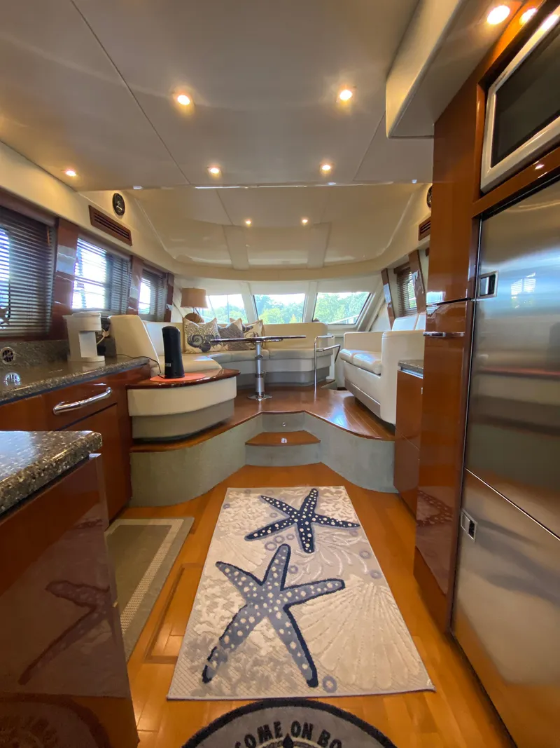 Slide: The Image of Luxurious interior of 2008 Sea Ray 47 Sedan Bridge yacht with modern furnishings. - 8