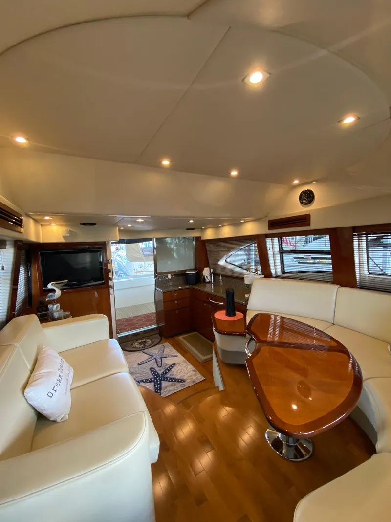 Slide: The Image of Luxurious interior of 2008 Sea Ray 47 Sedan Bridge yacht with elegant furnishings. - 9