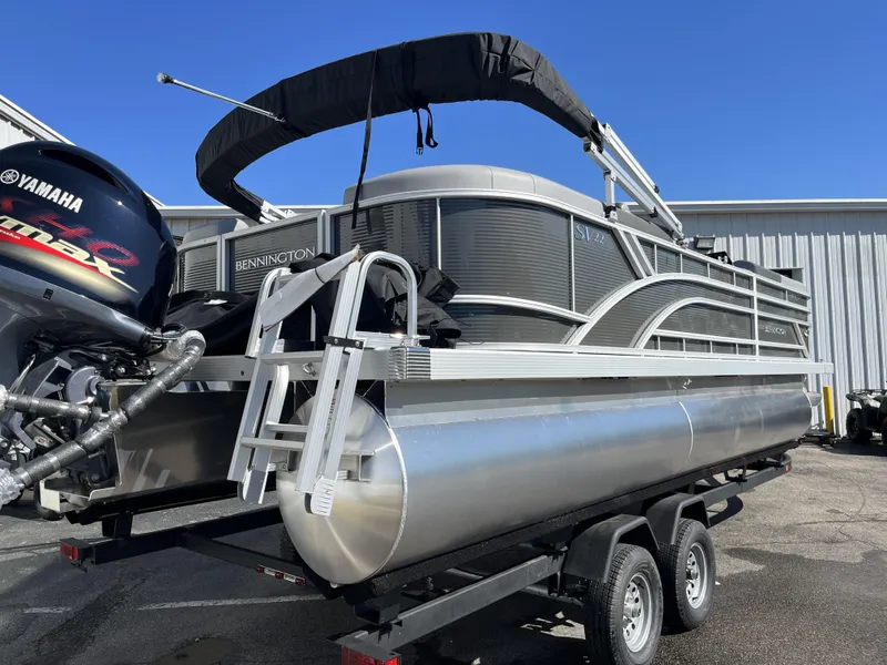 Slide: The Image of 2024 Bennington 22 SVSR pontoon boat on trailer with Yamaha outboard motor. - 5