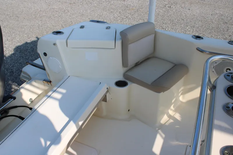 Slide: The Image of 2007 Scout 222 Sportfish boat interior with seating and storage compartments. - 13