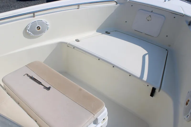 Slide: The Image of 2007 Scout 222 Sportfish boat interior with seating and storage compartments. - 16